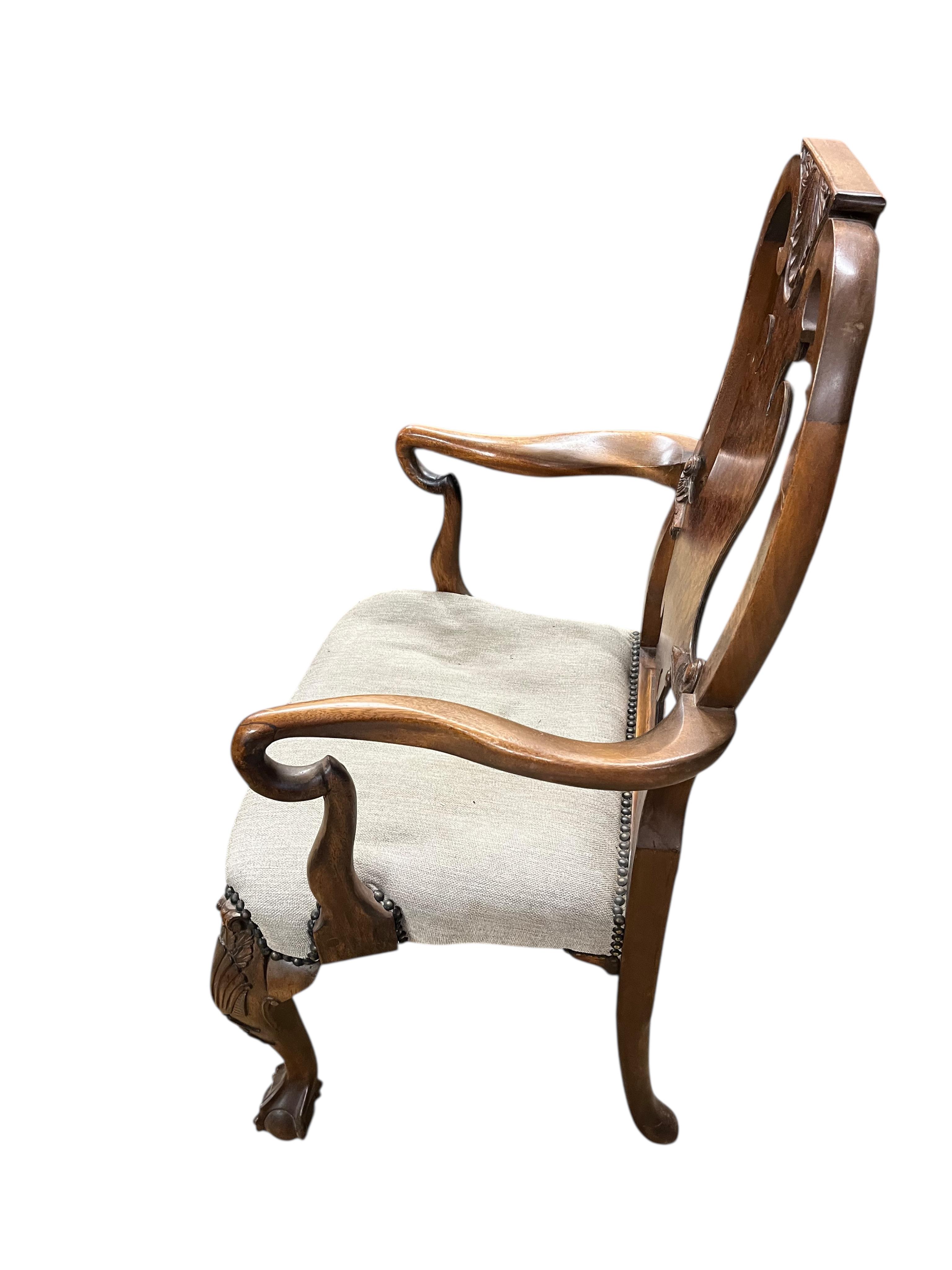 A George II style mahogany elbow chair, width 61cm, depth 45cm, height 105cm